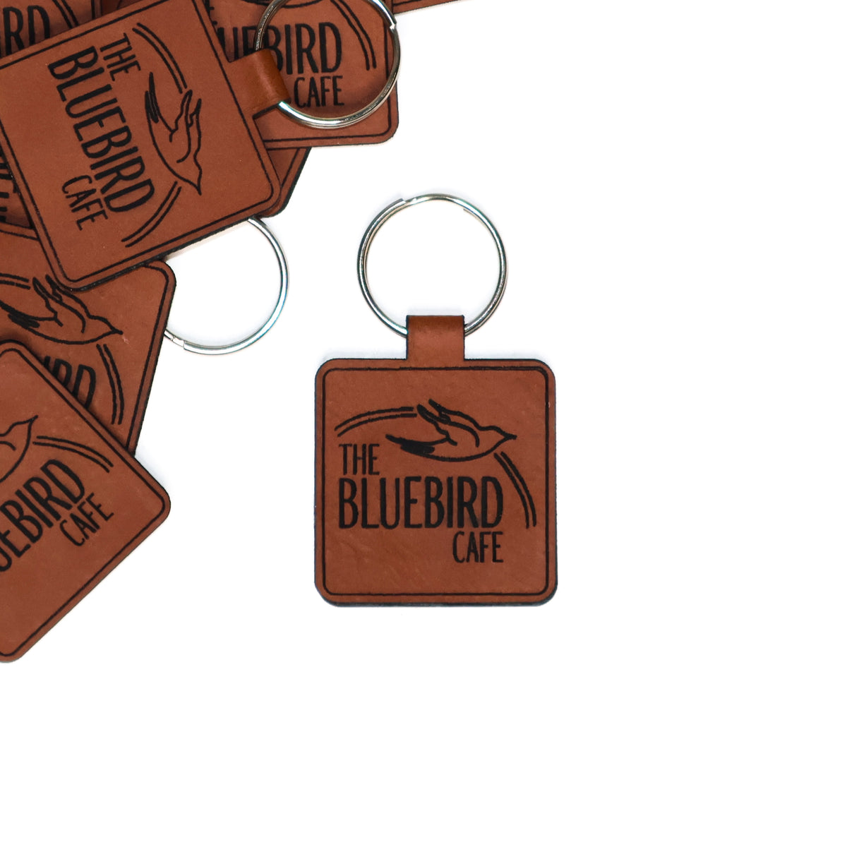 Looking for leather metal keychains like these. Hit me up with